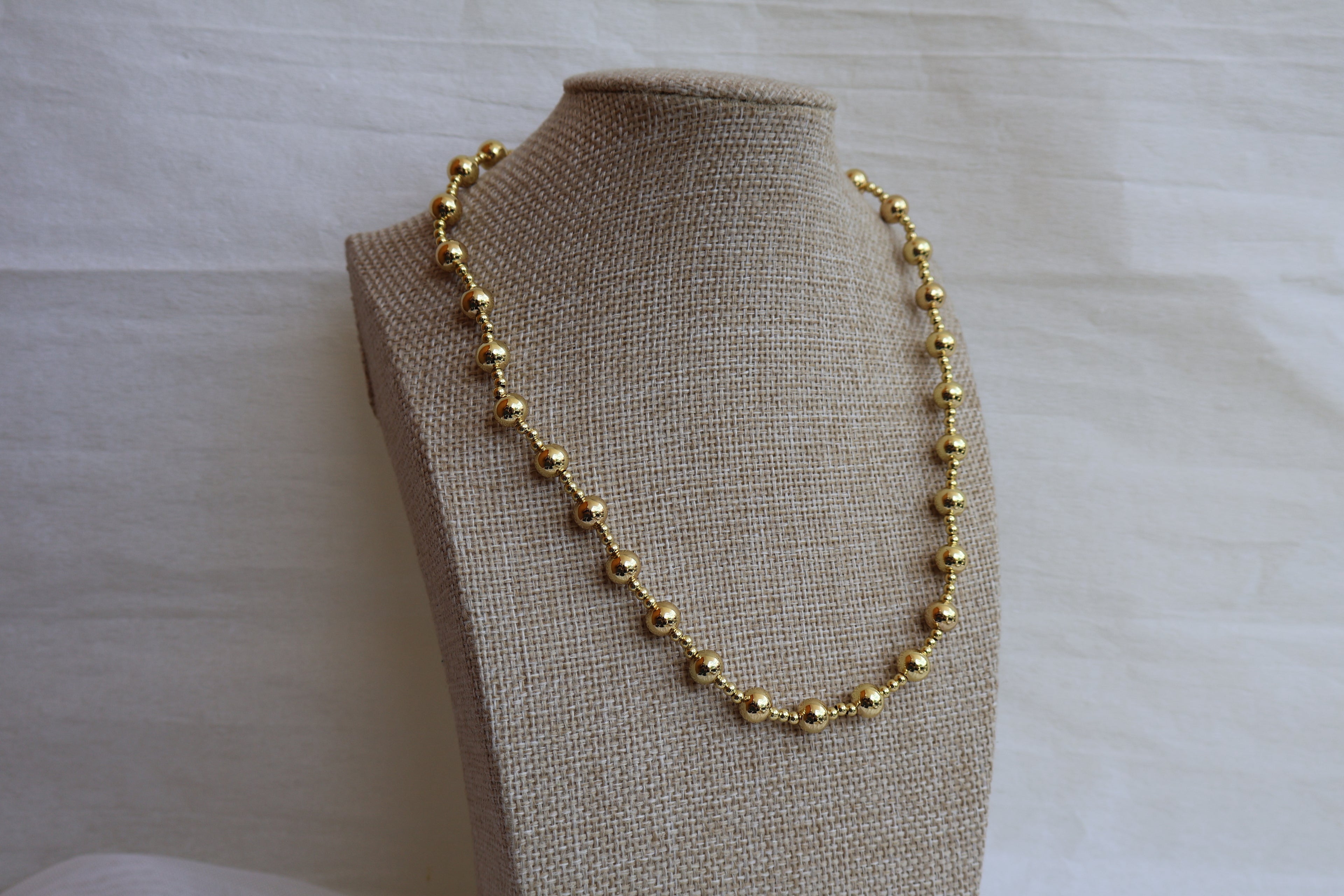 COLLAR PERLA DORADA