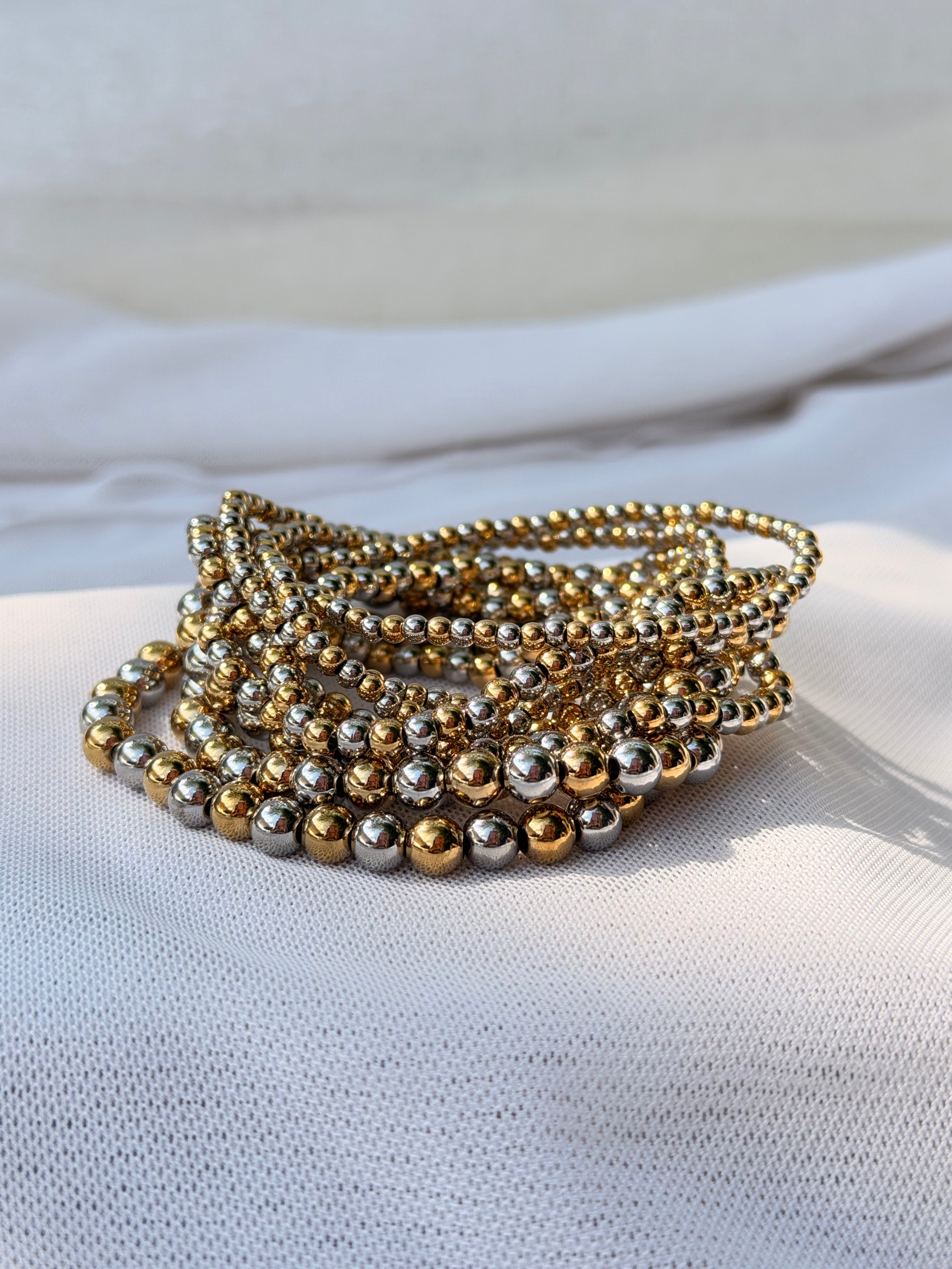 PULSERA BOLITAS BICOLOR